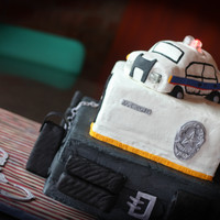 Police Academy Graduation I made this for my husband's graduation from the police academy. The bottom tier is a replica of his duty belt. The top tier has his...