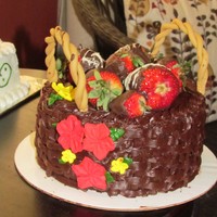 Chocolate Dipped Strawberry Basket i made the handles out of gumpaste, i should have made them darker!basketweave on the sides to give it the basket effect and strawberries...