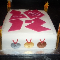 2012 Olympic Cake Choc fudge cake covered with fondant for my brother's Opening Ceremony party for the London 2012 Olympics.
