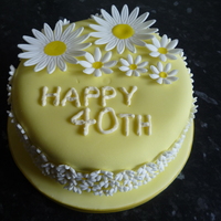 Chocolate Fudge Cake Covered With Fondant Daisies Chocolate fudge cake covered with fondant daisies