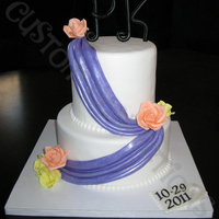 Swags Bridal Showe Cake first time making fondant swags. didn't turn out as perfectly as i wanted but i do like my roses.