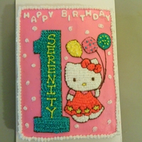 Hello Kitty 1St Birthday Cake This is an almond cake with buttercream filling and decorations. The customer gave me a picture of her babies invitations and I drew the...