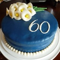 Calla Lily 60Th Bday Cake This is for my mother-in-law's 60th birthday. WASC cake recipe from this site and lemon buttercream icing. All decorations and...