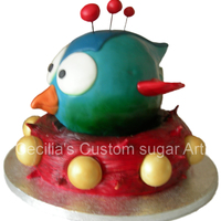 Tiny Wings I made this cake for my son at his request. It is based on his favourite game Tiny wings. It is all cake and the wings,beak and spikes are...