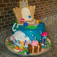 Coral Sea Shells Lalaloopsy This is a chocolate cookies and cream filled, and fondant decorated cake. The sandcastle is RKT, so is the gift, cake, and treasure chest....
