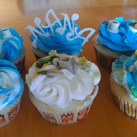 Mother's Day Cupcakes For the dog loving, tea drinking, molasses cookie eating, outdoor garden lover! Vanilla, strawberry filled, bc frosted, with fondant...