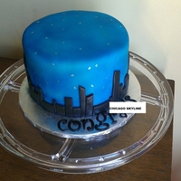 Skyline This was a graduation cake for a finance student moving to Chicago. The cake was cinnamon roll - esque. It was a vanilla and cinnamon...
