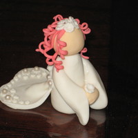 Wedding Topper - Bride Saw the design on youtube. Made out of gum paste. This is a practise peace, I will make the hair fuller and more flowers on the real one, I...