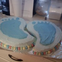 Baby Feet Marbled cake with butter cream icing. Used the medium sized paisley pan for the "feet" look.