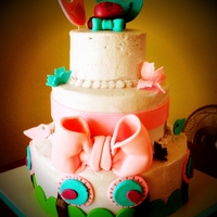 Love Birds Baby Shower Cake covered in cream cheese buttercream. Carrot and red velvet cakes.