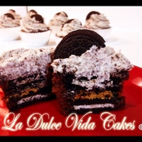 Oreo Goodness!! Oreo peanut butter brownie cupcakes iced in whipped Oreo frosting! Delicious!!