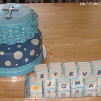 Christening Cake I made this for my second cousin's christening, and loved the way it turned out. The bottom tier was chocolate chocolate chip cake,...