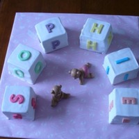 Christening Name Blocks A christening / Baptism cake with a difference! Each letter of her name on a block each!