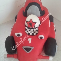 Roary The Racing Car Vanilla sponge carved to the shape of roary. Covered in Red fondant. All accents are fondant. TFL