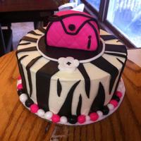 Zebra Print With Purse My first zebra print. Had much fun making the purse! Cake was 3 layers of pink velvet, filled and iced in vanilla buttercream with mm...