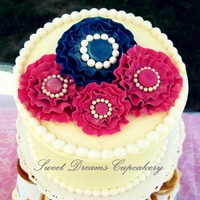 Ruffle Fondant Flowers Fondant ruffle flowers with pearls a top a wedding cake