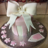 Pink Gift Box Cake This is the first time I have ever decorated a cake and I think it came out pretty well. It was a surprise gift for a friend and she wasn&#...