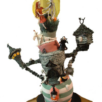 Nightmare Before Christmas My grandson found a similar cake online and wanted one for his birthday. The bottom layers are chocolate, the upper ones are red velvet,...