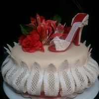Red Shoe All made from gum paste and fondant. White Velve cake with raspberry puree and Italian butter cream filling