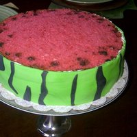 Watermelon Cake Strawberry cake with chocolate chips and fresh strawberries and cream cheese in the middle layer