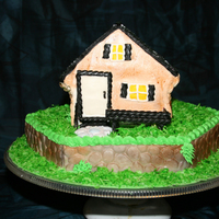 House Cake I did this for a co-worker that just closed on a place. This was my first time doing a house cake and working with modeling chocolate.
