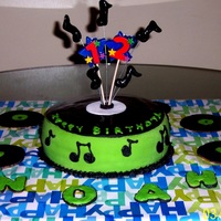 Cd Cake This cake was made for a 12-year-old boy on his birthday, along with CD shaped cookies!