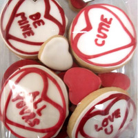 Valentine Cookies Sugar cookies decorated with royal icing. Love hearts with messages.