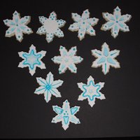 Snowflake Cookies Just practicing some cookie decorating techniques. I don't make decorative cookies very often, but would like to learn.
