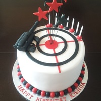 Laser Tag Themed Boy's Birthday Cake This is a cake for a Laser Tag theme with target and gun.