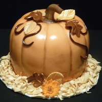 Fall Pumpkin Fondant over carved cake. Gumpaste leaves, stems and straw.