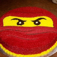 Red Ninjago 12" round devil's food cake buttercream icing