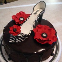 Moms B-Day Cake Cake is chocolate with cherry and whipped caramel filling, iced in chocolate and topped with dark chocolate ganache (my mom loves chocolate...