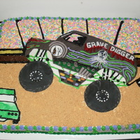 Monster Truck Show 18x24 inch cake showing one of the most popular monster trucks. Alot of piping and fondant work along with spinkle stands and graham...