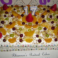 What A Fruit! Peaches, pineapples, Grapes, Strawberries and chopped pecans top this French vanilla cake. Fresh fruit is used whenever possible and the...