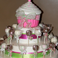 Faith's 1St Birthday One giant cupcake cake and some cake pops to celebrate Miss Faith's first birthday!