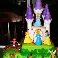 Dora's Royally Enchanted Adventure I fondly called this my multiple personality disorder cake! *LOL* My friend's daughter wanted a Dora, TInkerbell/Disney Fairies and...