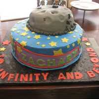 Buzz Light Year This is before I added Buzz on the cake. Bottom layer is Sugarshack's bc with fondant accents (wasc). "Moon" is all fondant...