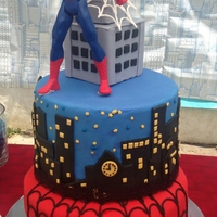 Spiderman Birthday Cake Used fondant to cover and designs on the cake. Web was made with royal icing.