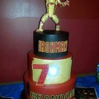 Iron Man 3 Birthday Cake Iron Man birthday cake for my nephew. The design was inspired by Cinderella Cakes. All vanilla cake marbled in red & gold Iron Man...