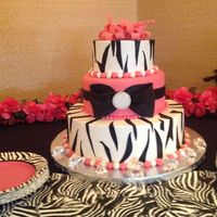 Fondant Zebra Accents On Buttercream Fondant Pink Tier With Fondant Bow Jewel Is Made Of Dragees Fondant And Sugar Crystals Pink Fond Fondant zebra accents on buttercream. Fondant pink tier with fondant bow. Jewel is made of dragees, fondant, and sugar crystals. Pink...