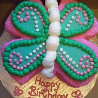 Butterfly Cake I had a client ask for a carved butterfly cake with cupcakes. I've never carved a cake before, and I didn't like it much,lol. I...