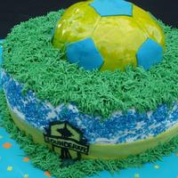 Sounders Soccer Chocolate and vanilla buttercream cake for a child's 7th birthday. Soccer ball is made with RKT and covered in fondant . The Seattle...