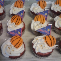 Slam Dunk! Strawberry cupcakes with strawberry flavored buttercream and fondant basketball!