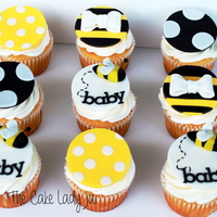 Bay Bee Shower Cupcakes Someone Purchased For A Gender Neutral Shower Cupcakes Are Lemon With Strawberry Filling And Cream Cheese Icing Th... Bay-Bee shower cupcakes someone purchased for a gender neutral shower. Cupcakes are lemon with strawberry filling and cream cheese icing....