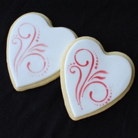 Stenciled Heart Cookies My first time stenciling!! Used shortening + petal dust on fondant.