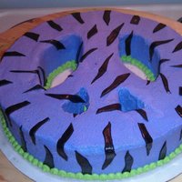 Peace Sign Zebra Cake I made this as a suprise for my friends daughter for her 12th birthday, her favorite colors are purple and gree, she loves zebra print...