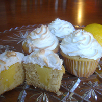 Lemon Meringue Cupcakes Vanilla cake filled with lemon curd and topped with real egg white meringue. TFL!
