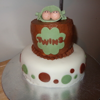 Twins Baby Shower Peas in the pod topper made out of fondant/gum paste. Top cake is lemon cake with lemon cream cheese buttercream. Bottom cake is WASC with...