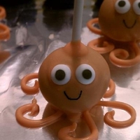 Octopus Cake Pop A cute little octopus cake pop for an under the sea theme birthday party.