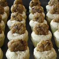 Chocolate Chip Cookie Dough Mini Cupcakes Vanilla cupcake with a cookie dough center, topped with cookie dough frosting and a mini chocolate chip cookie!